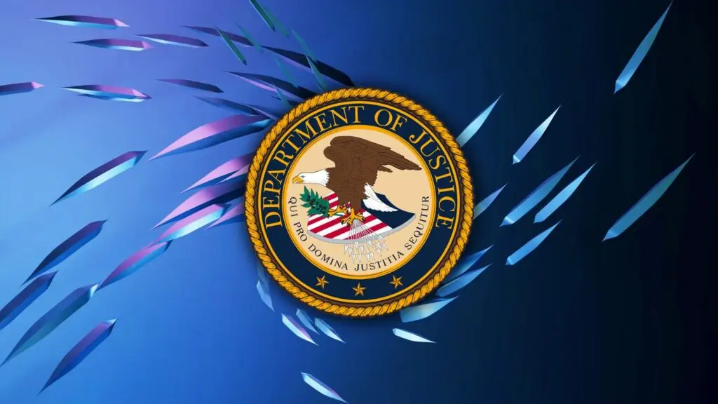 The image shows the seal of the U.S. Department of Justice placed against a futuristic background with abstract, angular shards in shades of blue and purple, evoking themes of cybersecurity. The seal includes an eagle, a shield, and the Latin motto "Qui Pro Domina Justitia Sequitur.