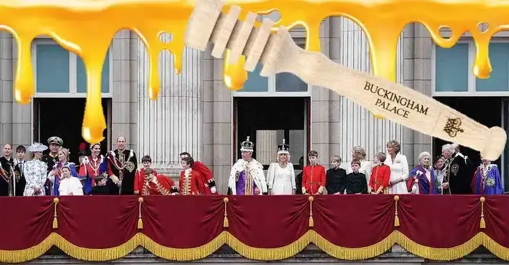 A group of people dressed in regal attire stand on a balcony adorned with red and gold decorations. Above them is an oversized wooden honey dipper dripping with honey, labeled "Buckingham Palace," symbolizing sweetness amidst the looming cyberthreats.