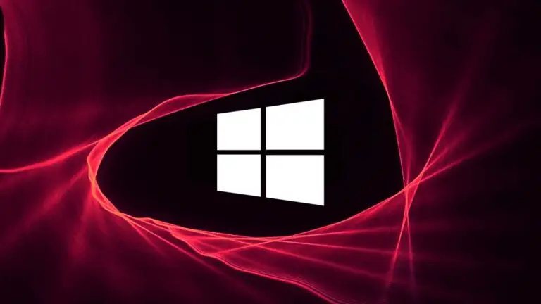 A Windows logo is centered against a dark background with vibrant red and pink light trails swirling around it, creating an abstract, dynamic effect reminiscent of CMMC standards. The sharp contrast highlights the white Windows logo, emphasizing cybersecurity amidst potential cyberthreats.