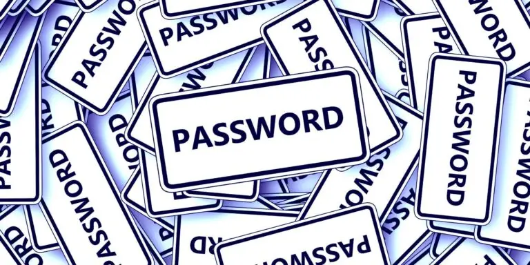 A chaotic pile of rectangular signs, each with the word "PASSWORD" written in bold black letters on a white background. The signs overlap each other randomly, creating a cluttered arrangement that echoes the overwhelming nature of a looming cyberthreat.