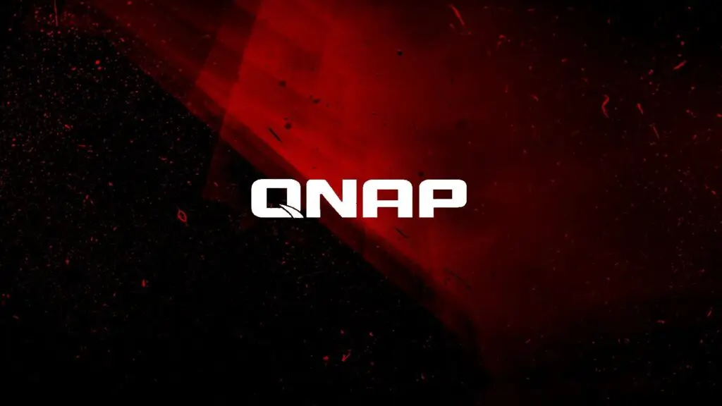 A dark abstract background with red and black hues, featuring the text "QNAP" in bold white letters centered in the image, exudes a sense of cybersecurity.