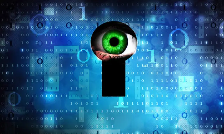 A green eye peers through a keyhole shape in the center of a digital background filled with binary code and various technological symbols. The image evokes themes of surveillance, privacy, and cybersecurity. Amidst blue and white binary digits, it serves as a stark reminder of cyberthreats and the importance of using a VPN.